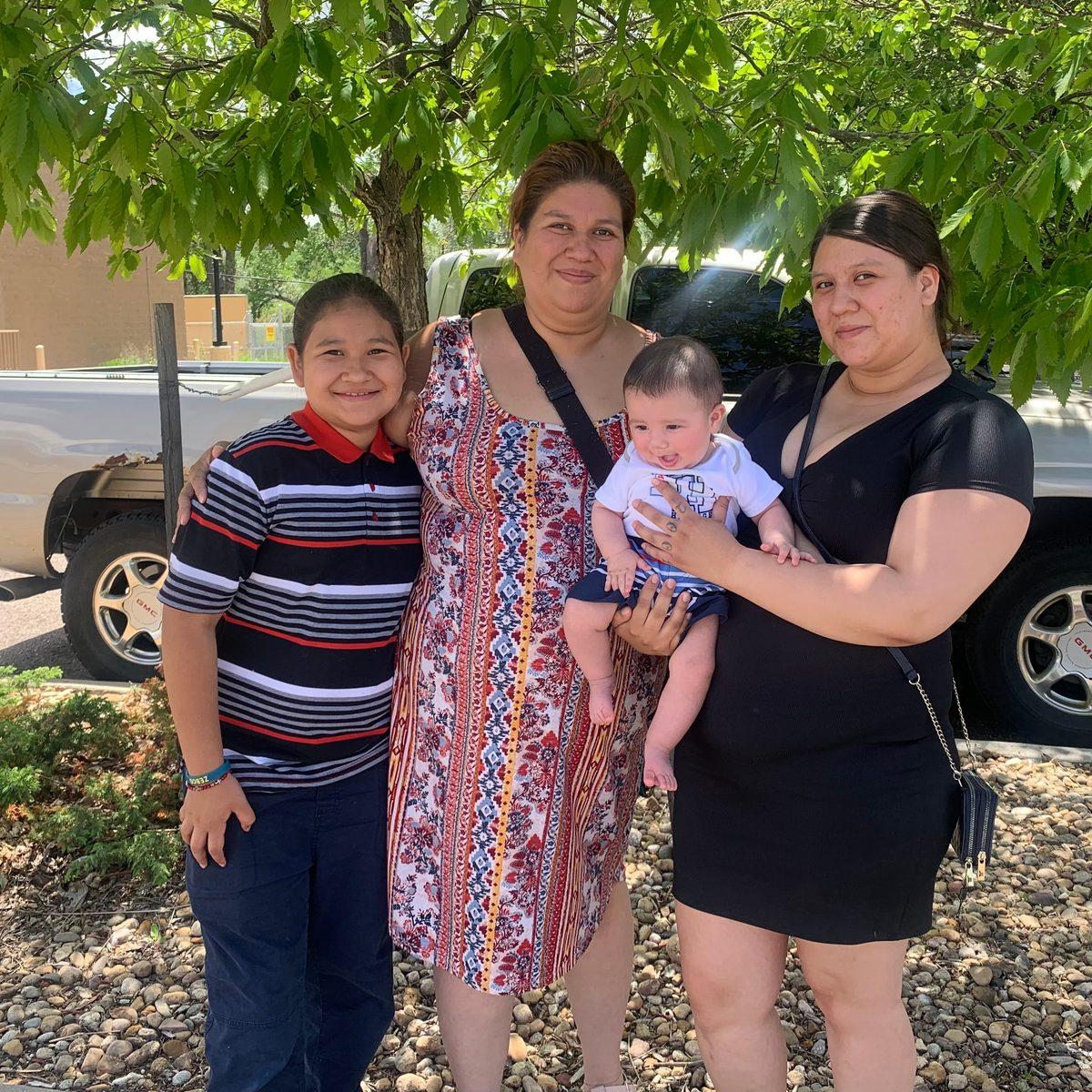 A ChannelMom mother outdoors with her children